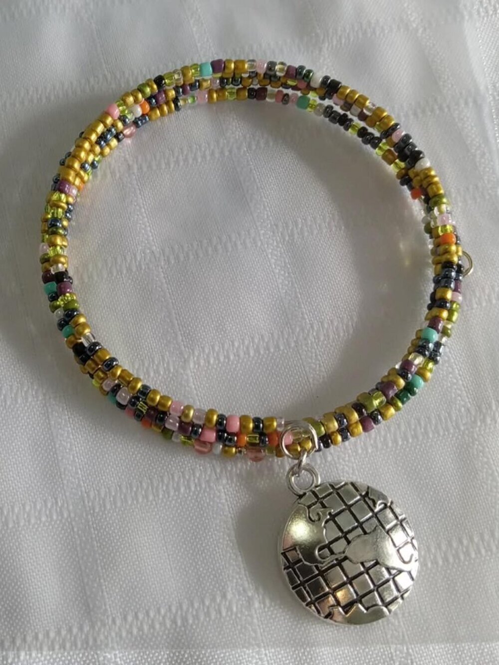 Handmade memory wire bracelet with beads and pendant